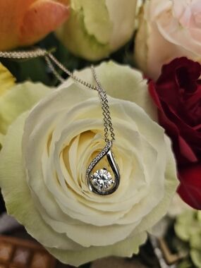 Sterling Silver Teardrop Pendant Necklace with Moissanite Stones